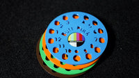 Butt Puck 4 pack stacked in blue, orange, green and brown